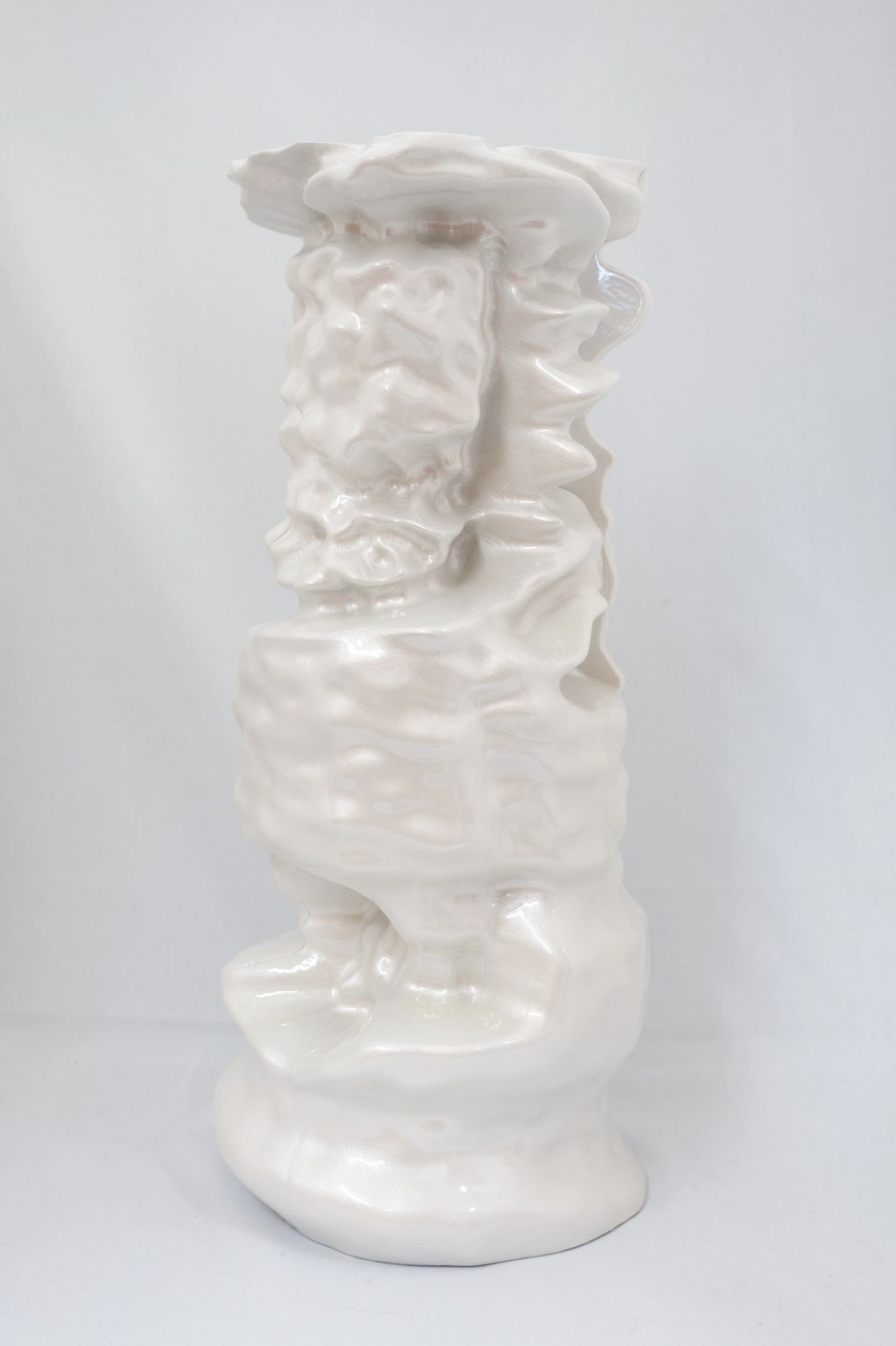 Oliver Pauk sculpture created using 3D printing and automotive paint. Ethereal white column.