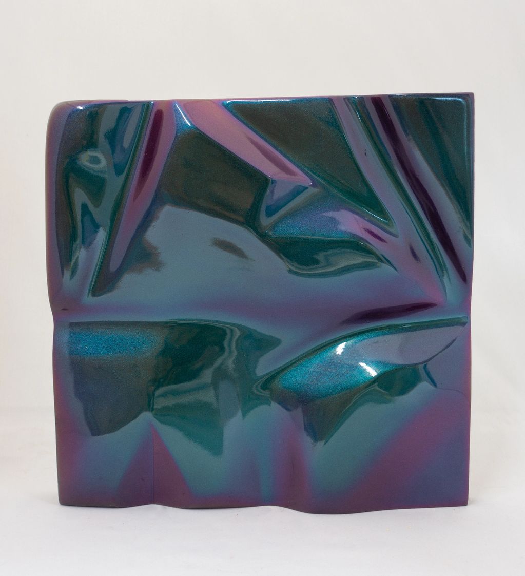 Iridescent and colour shifting sculpture created using handcarved foam and reflective car paint