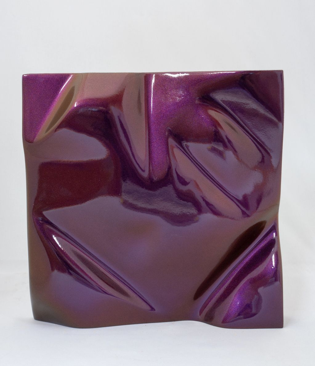 Iridescent and colour shifting sculpture created using handcarved foam and reflective car paint