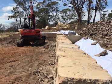 RETAINING WALLS - Supply & installation SANDSTONE BOULDERS & BLOCKS TOOWOOMBA GOLD COAST BRISBANE