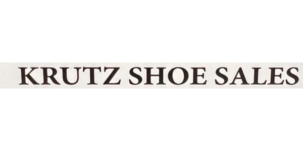 Sign reading 'KRUTZ SHOE SALES' in bold letters on a white background.