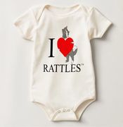 The design on this baby onsie is inspired by the book series, "Rattles, the Barn Cat."