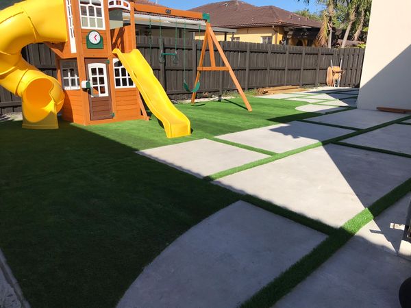 Synthetic Turf strips between concrete slabs Miami