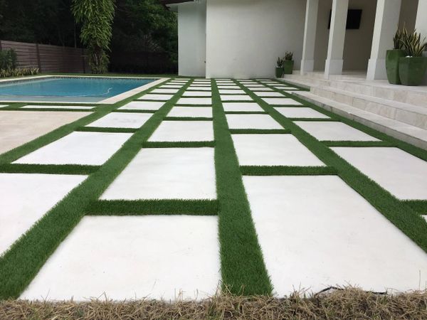 Synthetic Turf strips between concrete slabs Miami