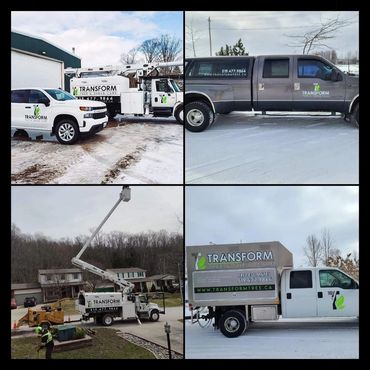 Some of our Equipment- featuring our forestry bucket truck with a 65 ft boom.