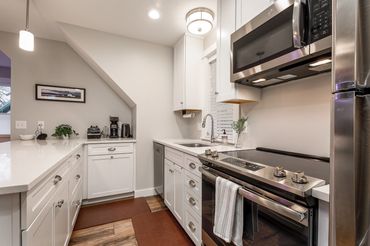 New garage apartment gorgeous kitchen. Downtown living has it's advantages