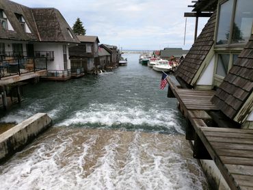 Fishtown dam in Leland Michigan where Lake Leelanau feeds Lake Michigan - amazing waterfront views.