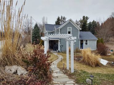 Maple City home, happy seller and buyer. Yes, homes sell in the early spring before the tulips rise.