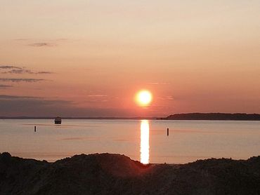 Suttons Bay Summer Sunrises are worth the early rise.