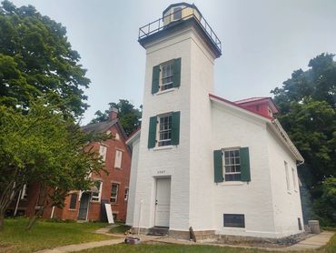 South Fox Island Lighthouse 14 miles offshore from Northport has been guiding mariners since 1867.