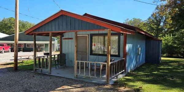 Cabin 1 covered porch and porch swing