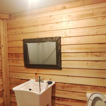 Cypress siding on a bathroom wall