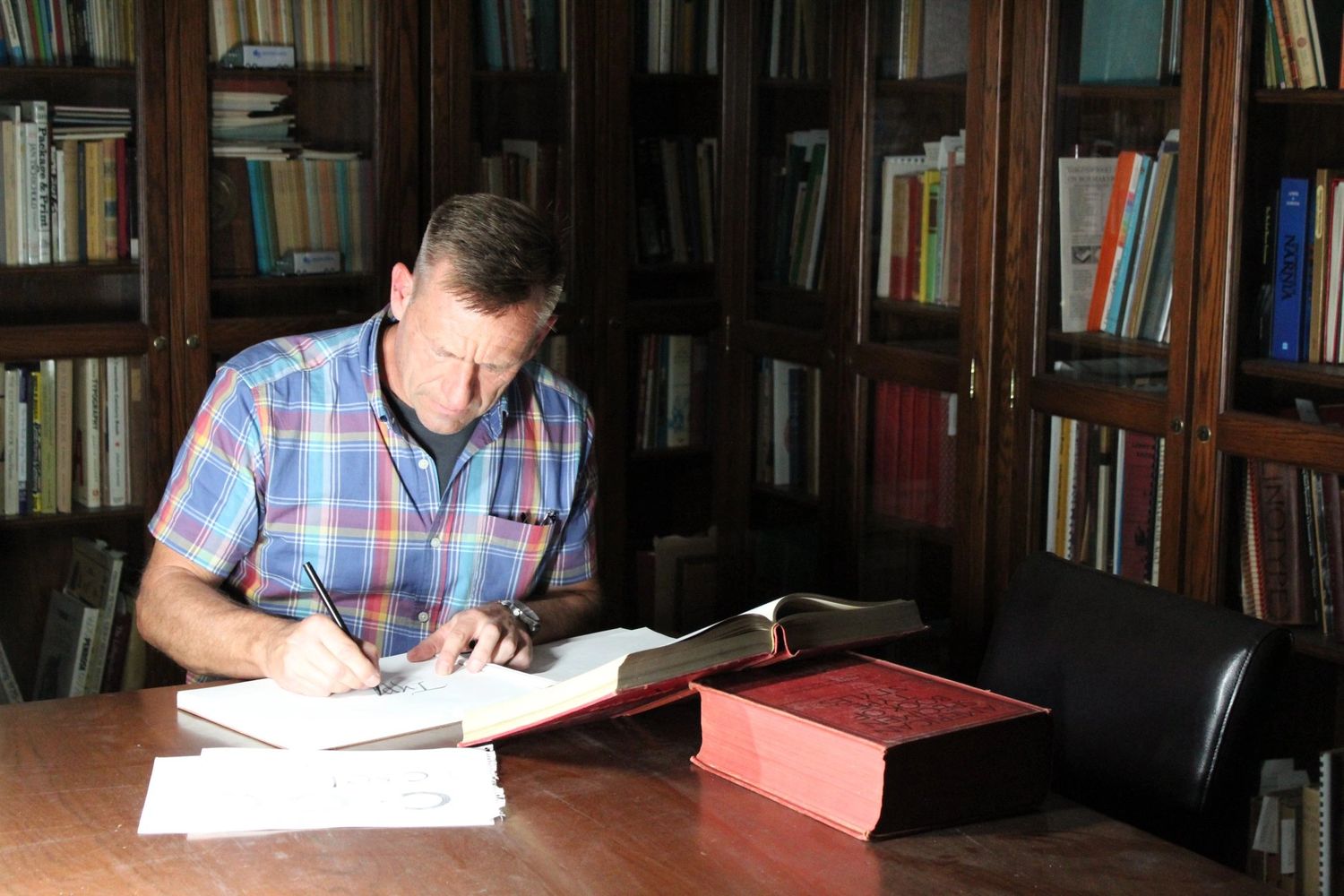 Type designer at work. Image courtesy of the International Printing Museum, Torrance California