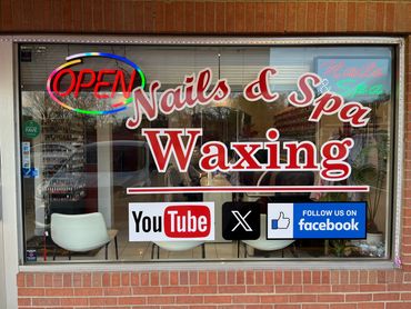 Large Window with Nails & Spa Waxing Text and Social Media Icons