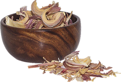 Wooden bowl filled with dried flower petals and more scattered outside.