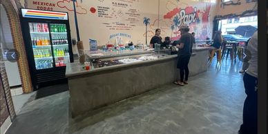 Casual Mexican food restaurant interior with counter service.