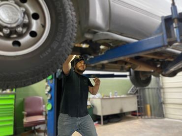 Collins taking care of a driveshaft repair