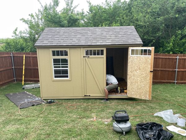 Wooden storage shed for backyard assembled 8x10 ft.