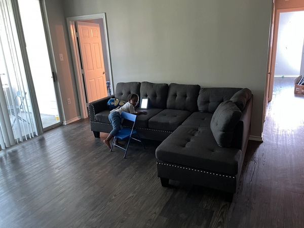 Sectional sofa assembled into an L shape