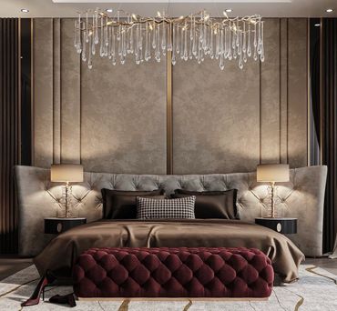 Luxurious bedroom with tufted velvet bench and modern chandelier.