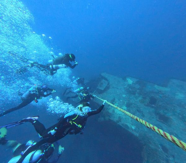 PADI Advanced Open water scuba divers and Key Largo scuba diving onto the USCG Duane in Key Largo