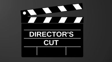 Director's cut clapperboard with quiz show battle and missing crack the code text.