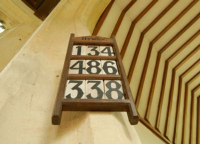 picture of a hymnboard in an old church