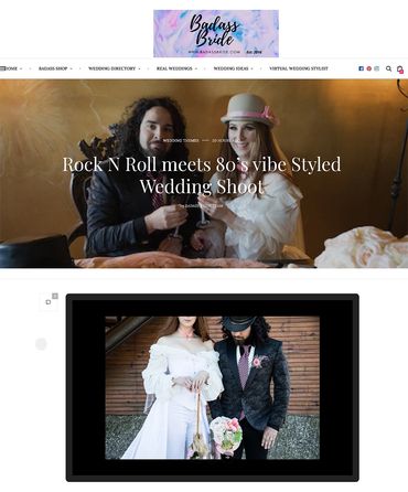 A groom with dark curly hair is toasting with a bride wearing a derby hat and smiling