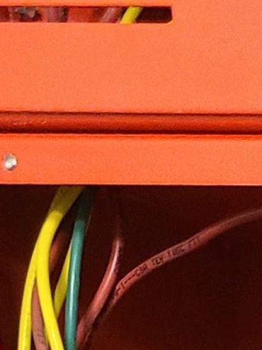 Wires going into battery bay