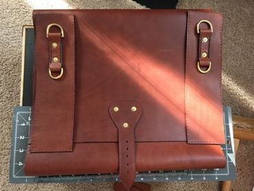 Making a leather messenger bag, handcrafted in Raleigh, NC.