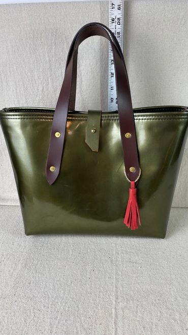 Green metalic leather tote,custom order with Strawberry Thief lining and pink tassel w/ brown straps