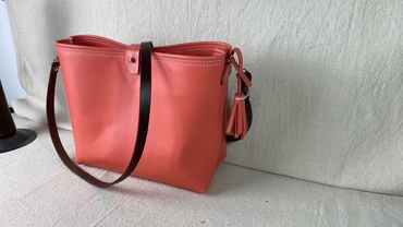 Salmon women's leather tote. We have men's and women's leather bags. Custom leather purses.