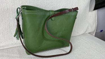 Green leather tote, custom designed leather tote with matching tassel and shoulder strap.