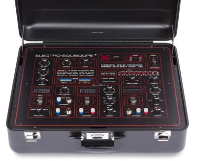 Open Electro-Equiscope device with control knobs and switches in a black case.