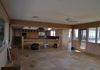 Main Level Entertainment Room to Kitchen