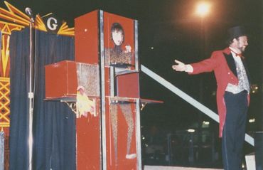 The Amazing Mr. G ( Jim Green Magician) performing the zig-zag lady at the Alabama State Fair.