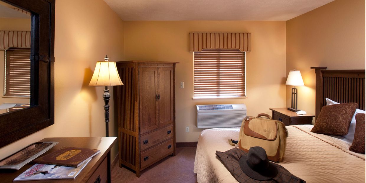 Single-occupancy guest rooms at The Signature Lodge.