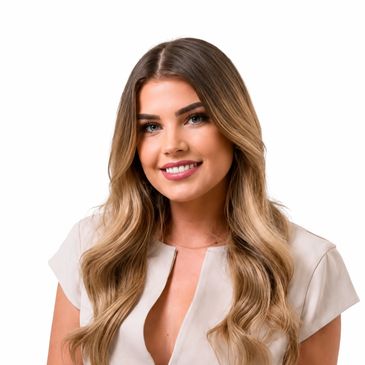Smiling young woman with long blonde hair, wearing a light beige top.