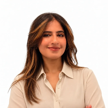 Confident woman smiling, wearing a beige shirt.