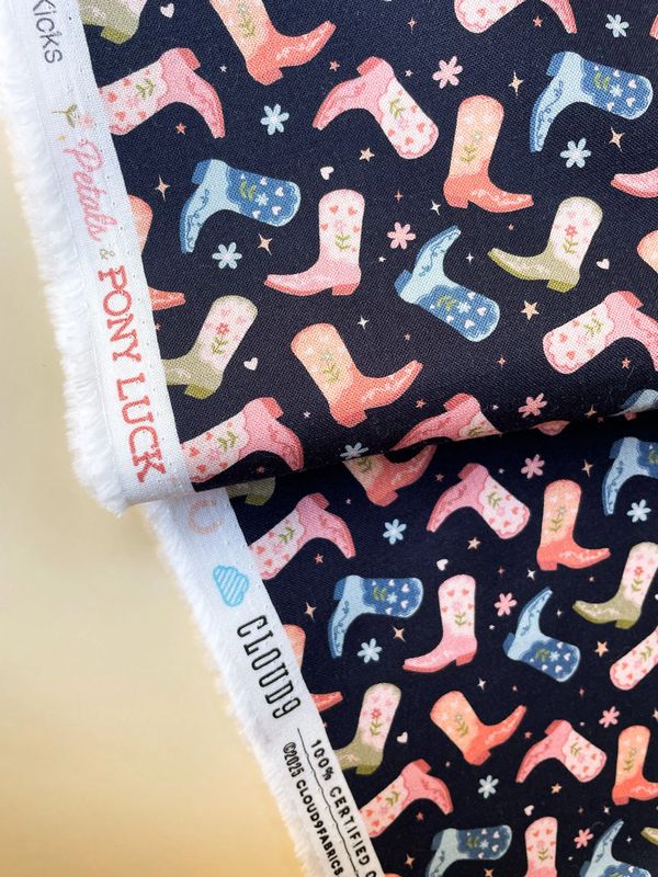 Cowgirl boot fabric in pastel colours on a navy background, Pony Luck collection.