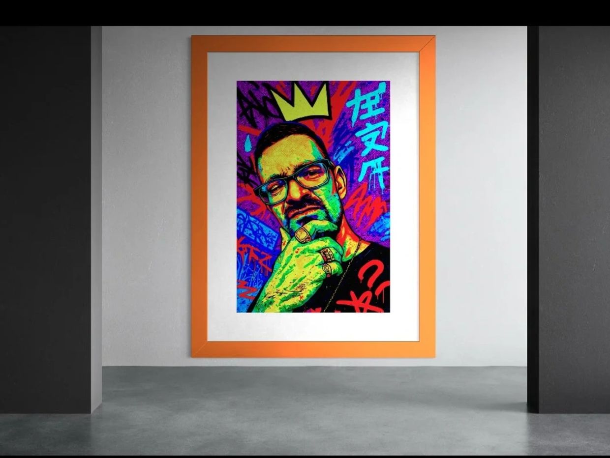 Colorful portrait artwork framed and displayed in a modern gallery space.