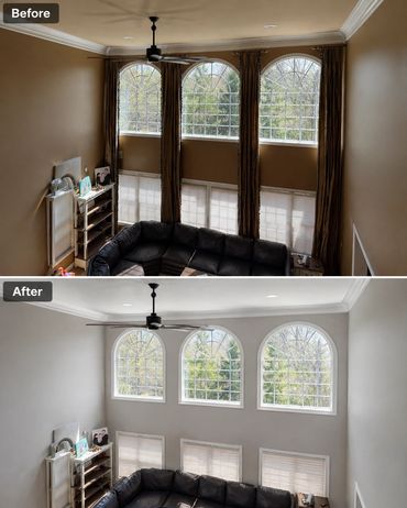 Living room transformation with fresh white walls and removed curtains for a brighter space.