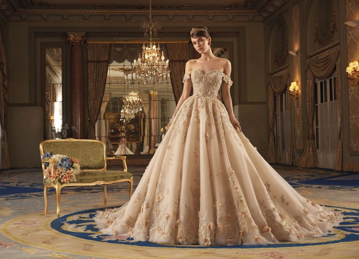 Demetrios sweetheart neck ballgown with flowers and lace. Strapless or off the shoulder cap sleeve.