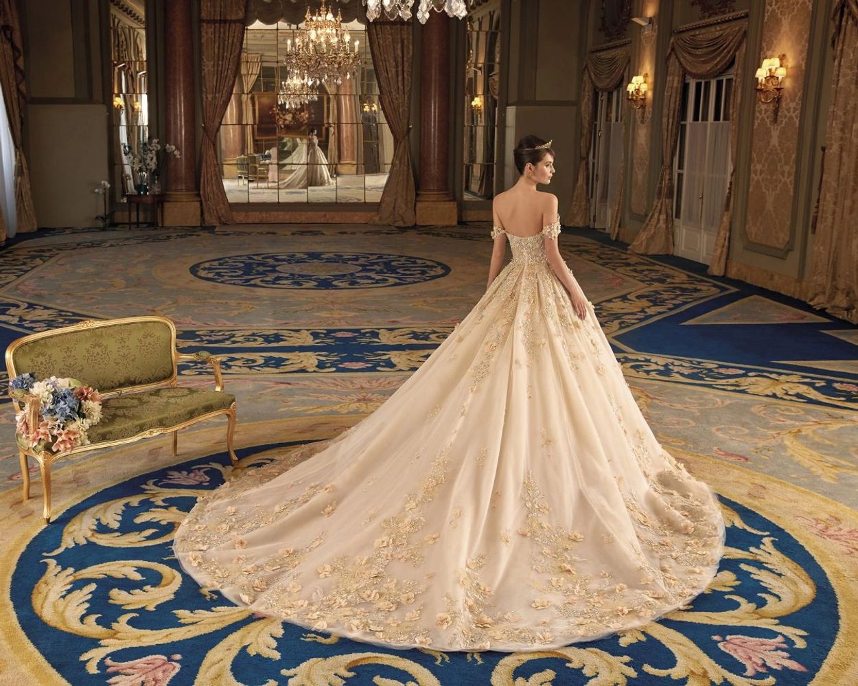Demetrios sweetheart neck ballgown with flowers and lace. Strapless or off the shoulder cap sleeve.