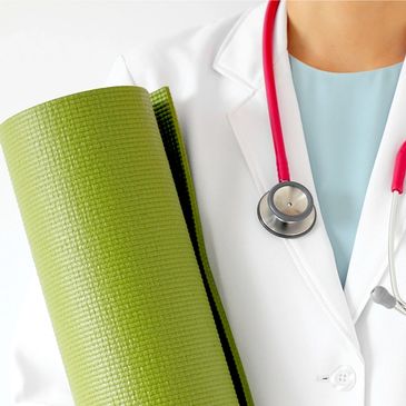 doctor holding a yoga mat