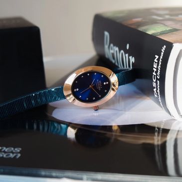 ladies watch in blue with oval watch face