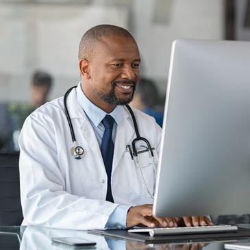 Doctor writing a nexus letter for a veteran.