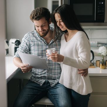 A veteran reviews his nexus letter with his spouse.