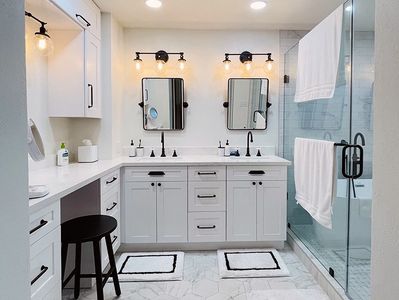 remodeled bathroom, white with black accent