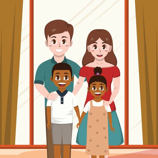 Happy family of four standing together indoors.